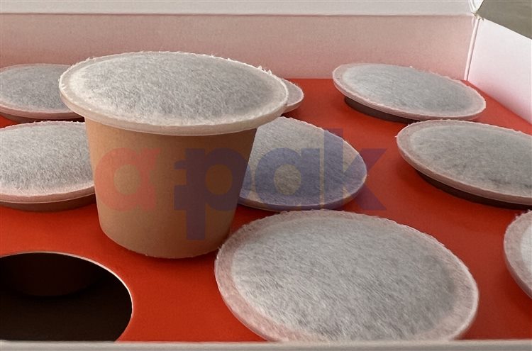 https://www.afpakmachine.com/wp-content/uploads/2023/03/compostable-nespresso-capsule-filling-sealing-machine-2.jpg