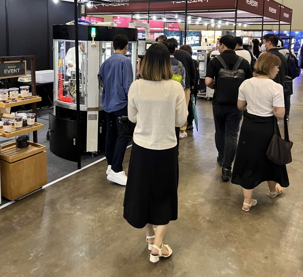 customer are seeing the RN1S coffee capsule filling sealing machine 2